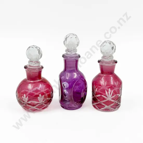 Three Small Coloured Glass Vanity Bottles