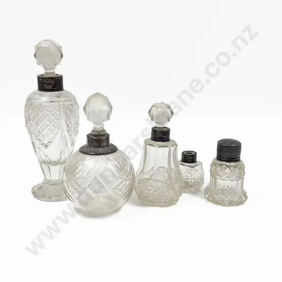 Five Silver Collared Vanity Bottles