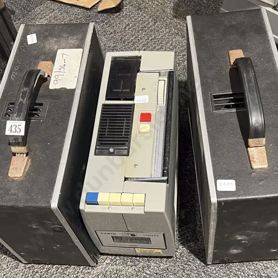 Three Vintage Projectors with Projector Screen