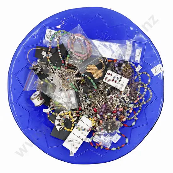 Quantity of Assorted Costume Jewellery on Blue Glass Charger