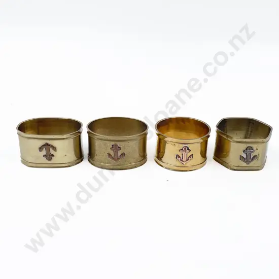 Four Brass Napkin Rings with Anchor Emblems