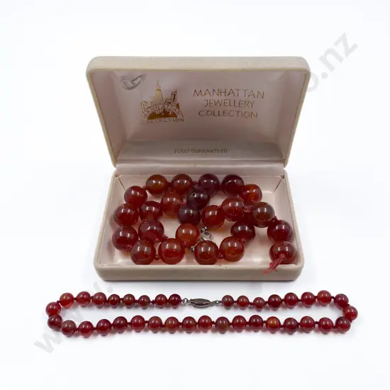 Two Uniform Large and Smaller Carnelian Bead Necklaces