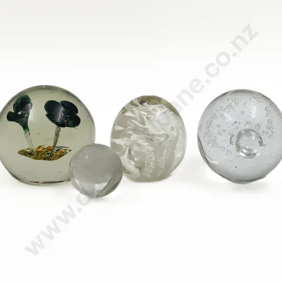Four Glass Paperweights