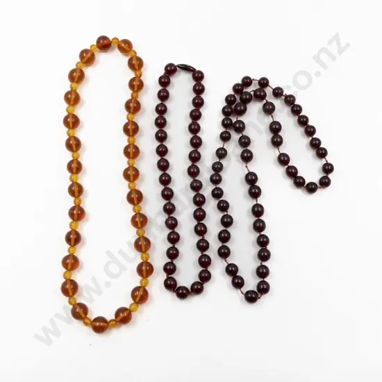 Two Vintage Uniform Cherry Amber Bead Necklaces