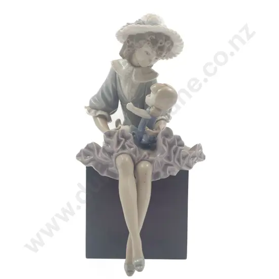Lladro Seated Figure of Girl and Doll on Wooden Base