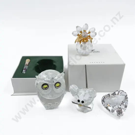 Four Swarovski Ornaments