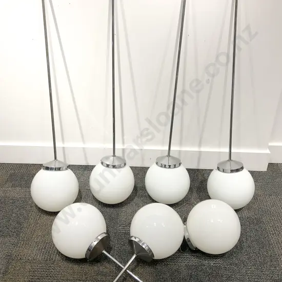 Seven Art Deco Chrome and Opaque Glass Light Fittings