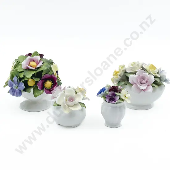 Four Assorted Ceramic Flower Ornaments