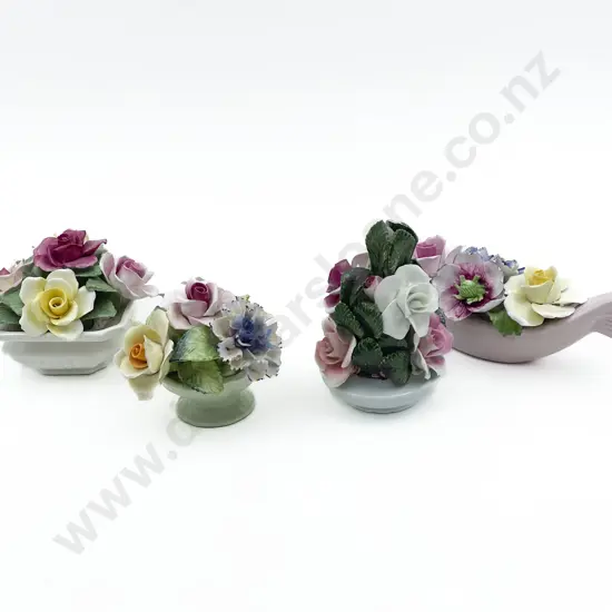 Four Assorted Ceramic Flower Ornaments