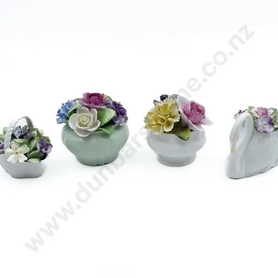 Four Assorted Ceramic Flower Ornaments
