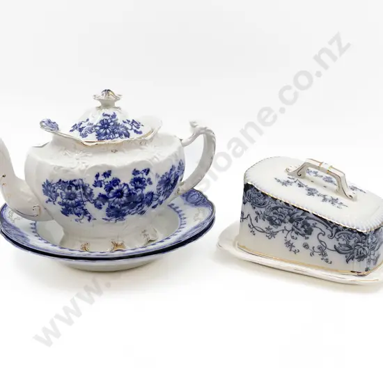 Four Pieces of Blue and White Including Teapot and Butter Dish