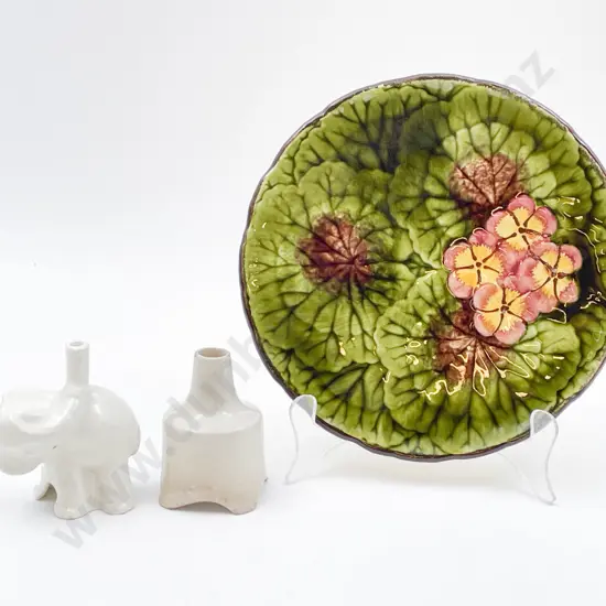 Two Vintage Ceramic Pie Funnels on Floral Plate