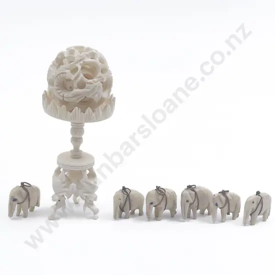 Small Carved Ivory Puzzle Ball on Three Elephant Stand