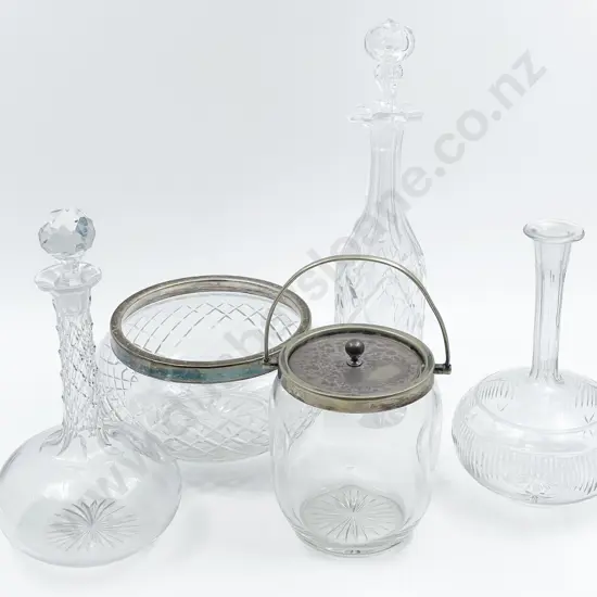 Three Assorted Decanters with Glass Biscuit Barrel and Salad Bowl