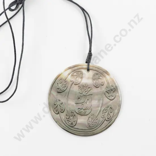 Mother of Pearl Tiki and Koru Carved Pendant