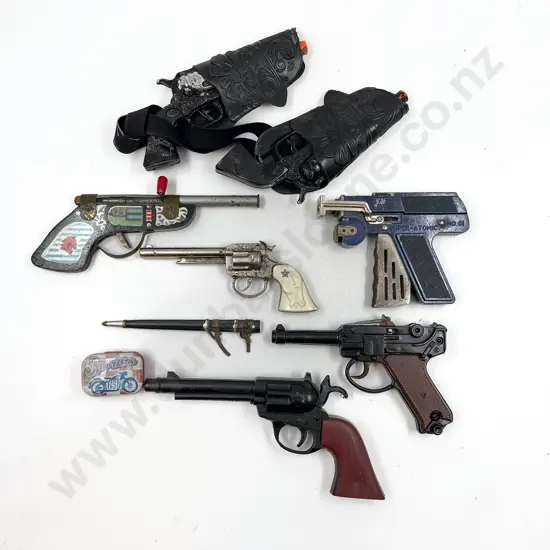Seven Toy Pistols including No91 Super-Atomic