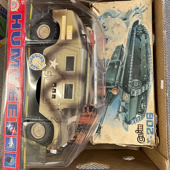 Two Boxed Military Vehicles