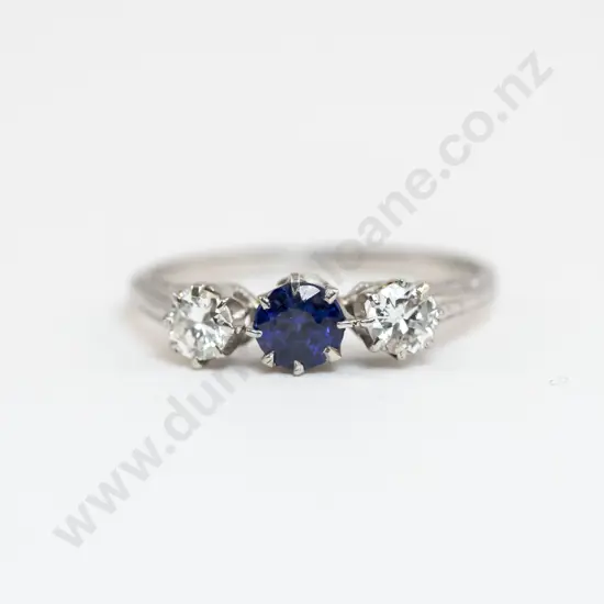 All Platinum Three Stone Sapphire and Diamond Bridge Ring