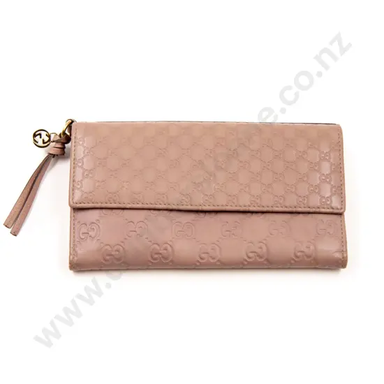 Gucci Embossed GG Pink Leather Wallet