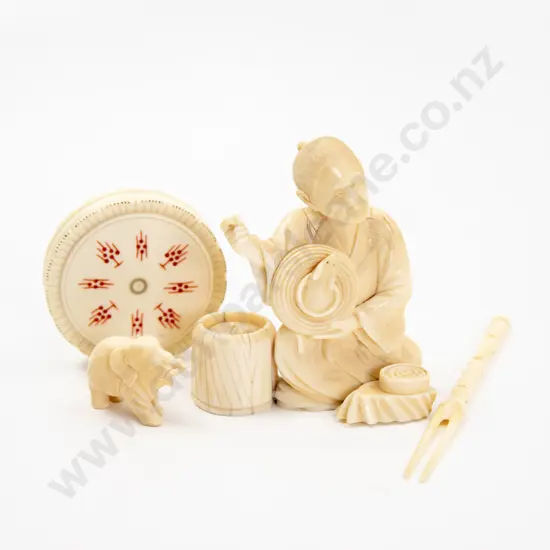 Carved Ivory Figure of a Seated Rat Catcher