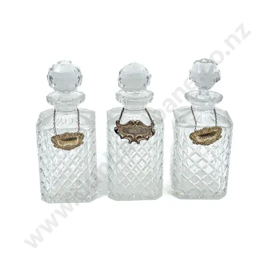 Matched Set of Three Crystal Decanters with Labels