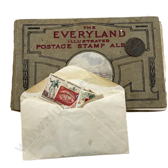 World Stamp Album and Envelope of Assorted Stamps