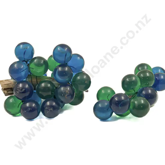 Two bunches of Lucite Grapes