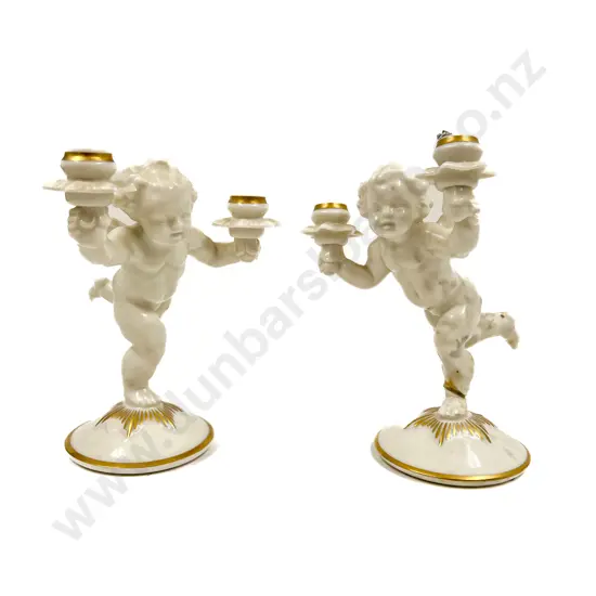 Pair of Hutschenreuther Cherub Form Candleholders (one a/f)