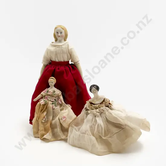 Two Small German China Head Dolls and Wooden Doll