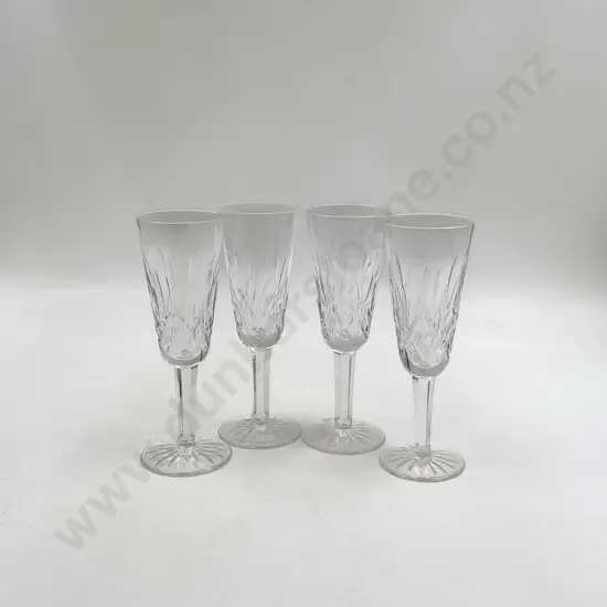 Four Waterford Crystal Champagne Flutes