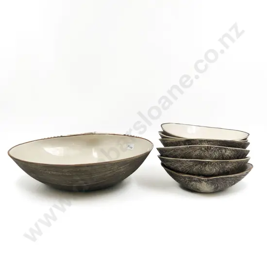 Set of Six Royce McGlashen Shell Form Bowls together with Larger Example