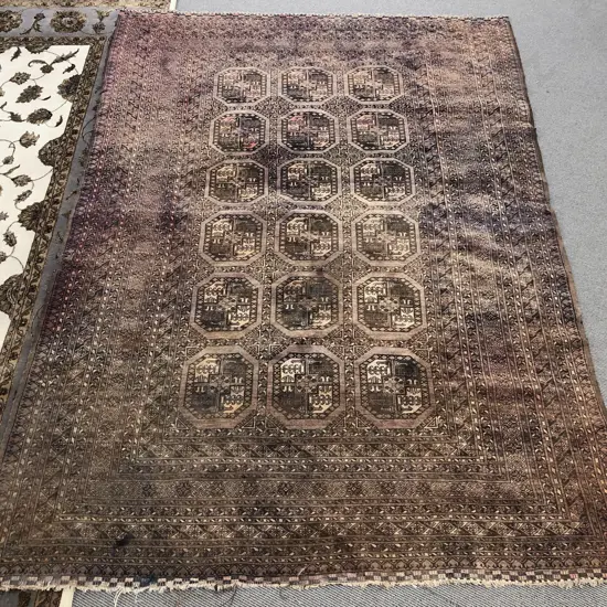 Antique Turkoman Floor Rug with Three Rows Of Octagonal Gols on Sun Faded Red Ground