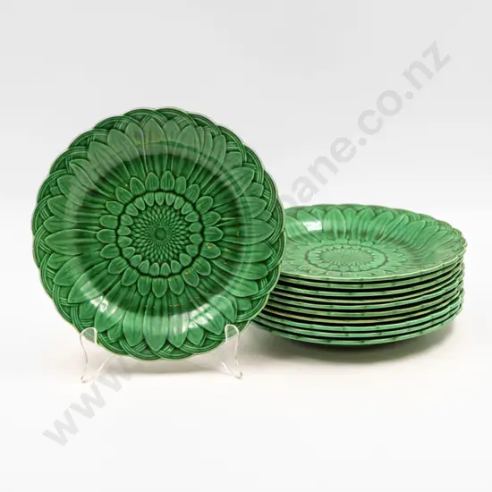 Eleven Wedgwood Green Glazed Leaf Moulded Dessert Plates