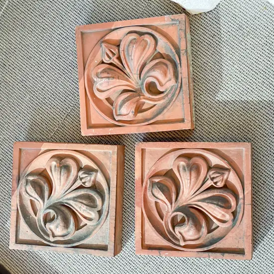 Three Salvaged English Architectural Terracotta Tiles