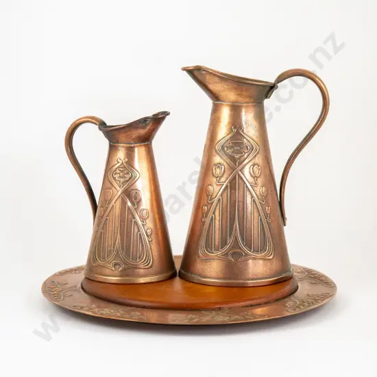 Pair Of Graduated Art Nouveau Copper Jugs By Joseph Sankey & Sons
