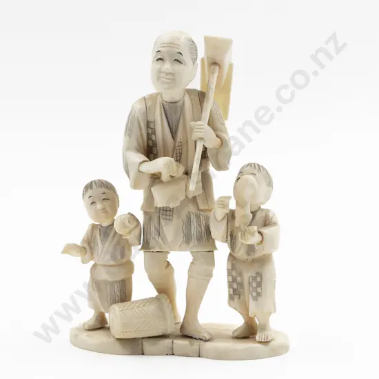 Japanese Signed Carved Ivory Figure of a Farmer and Attendants