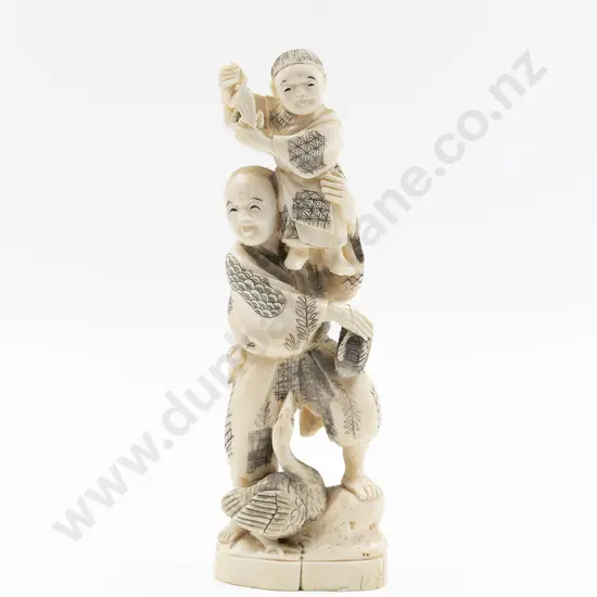 Japanese Signed Carved Patterned Ivory Standing Figure of Man and Young Boy