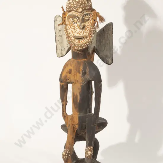 A Sepik River Figure With A Cassowary Bird