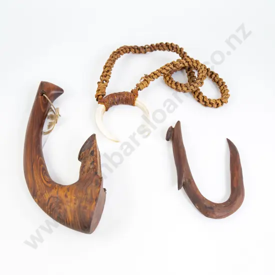 A Carved Wood Adze Handle And Matau With A Boar Tusk Necklace