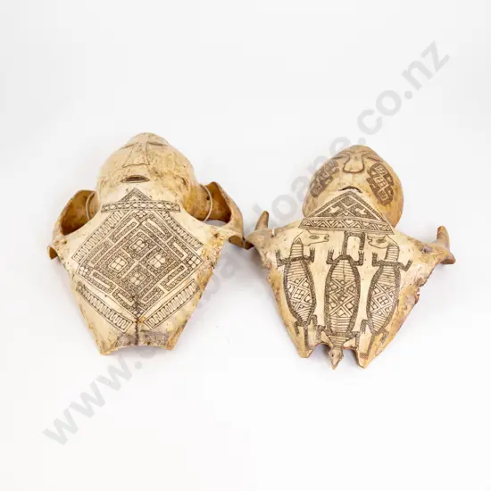 Two Carved Horse Skull Figures