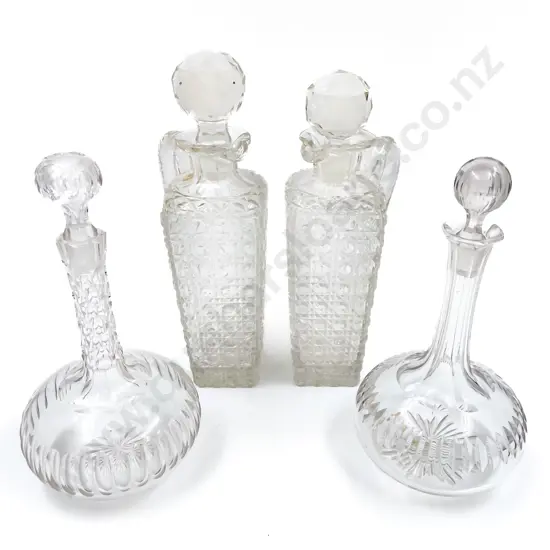 Two Decanters and Pair of Glass Stoppered Ewers