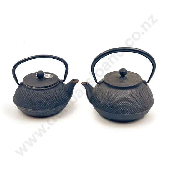 Graduated Set of Two Cast Iron Teapots