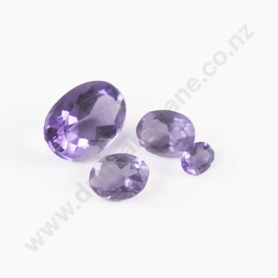 Four Unmounted Amethyst Stones