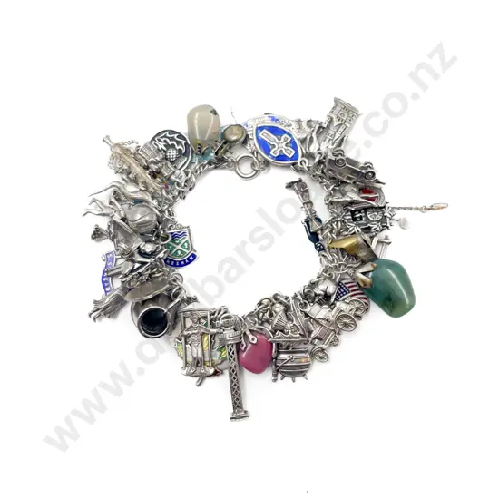 Charm Bracelet with Assorted Mostly Silver Charms