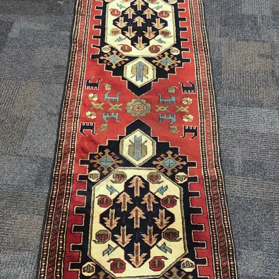 Good Quality & Sized Woollen Persian Hall Runner with three large centralized medallions & animals motifs throughout