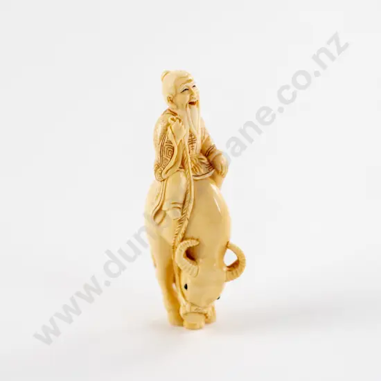 Signed Ivory Netsuke of an Immortal Riding a Water Buffalo