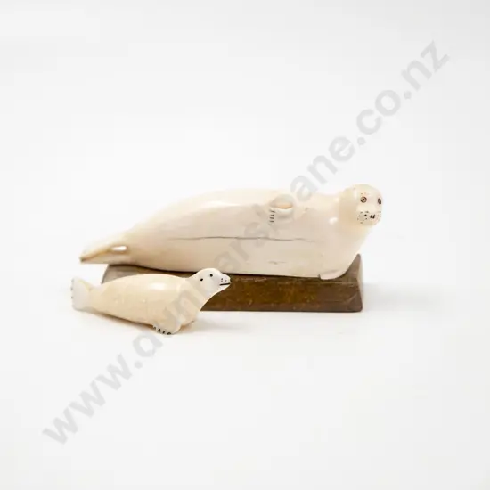 Two Vintage Eskimo Carved Marine Ivory Recumbent Seals