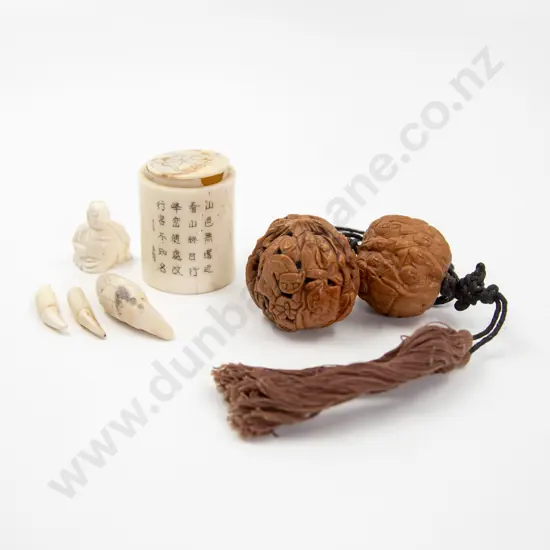Two Chinese Carved Walnut Shells