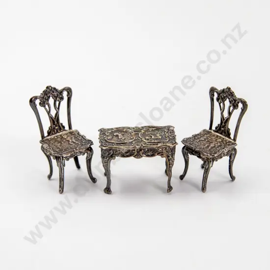 QEII S/S Miniature Ornately Embossed Table and Two Chairs