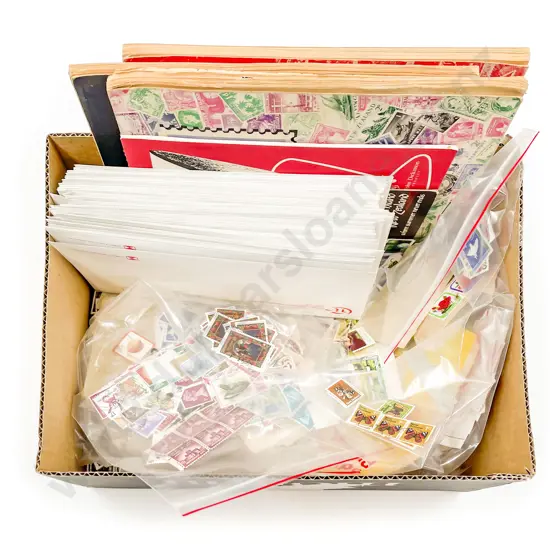 Three Small World Vintage Stamp Albums with loose and semi-sorted stamps